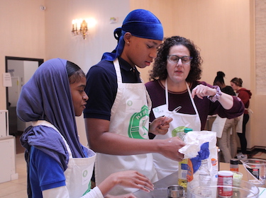 Students cooking at Kitchen of Life 